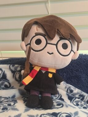Universal Plush Wizard Doll in Brown, Black, Red, Yellow